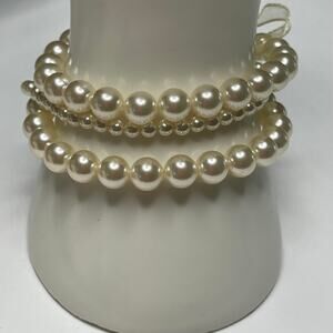 Set of three faux pearl bracelets stretch pull on classic costume jewelry